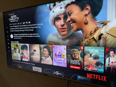 a television screen with a movie on it at Destina Stays @Air Residences Makati, MetroManila in Manila