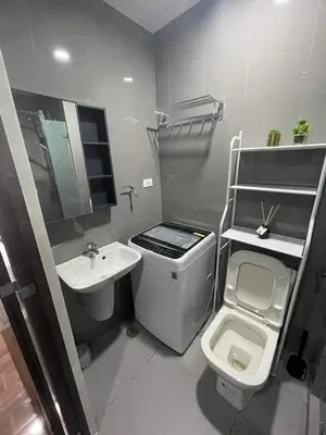 a small bathroom with a sink and a toilet at Destina Stays@ Air Residences Makati, Metro Manila in Manila