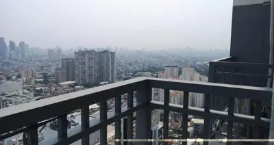 a view of a city from the top of a building at The ICONIC: Comfortable living by Awsom Phil in Manila