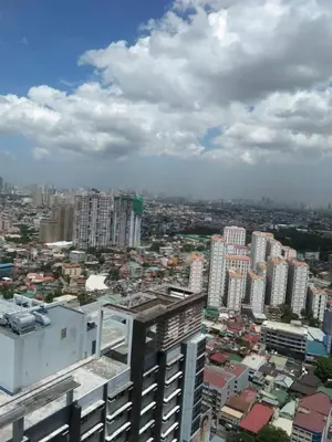 a view of a city with tall buildings at The ICONIC: Comfortable living by Awsom Phil in Manila