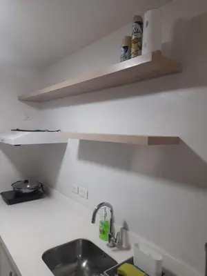 a kitchen counter with a sink and a shelf at AMAZING VIEWS ACROSS SHANGRILA MALL and NEAR MEGAMALL GREENFIELD DISTRICT in Manila