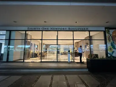 a man standing in front of a large building at NAIA Terminal 3 Insane Interior, Be the Boss in Manila