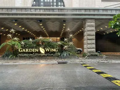 a garden wing sign on the front of a building at NAIA Terminal 3 Insane Interior, Be the Boss in Manila