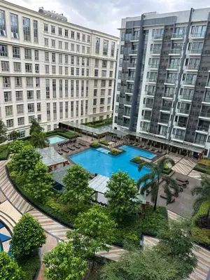 an aerial view of a large building with two pools at NAIA Terminal 3 Insane Interior, Be the Boss in Manila