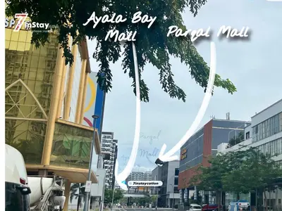 a view of a city street with buildings at 1BR Solemare Aseana MOA Okada Ayala Bay Mall COD Paranaque w/WIFI in Manila