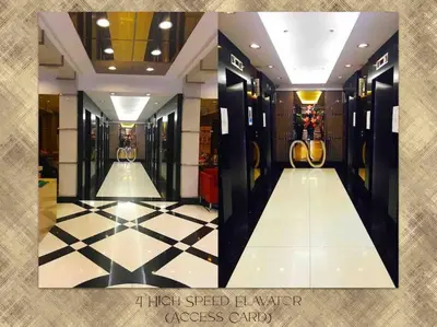 a dressing room with a black and white tiled floor at 1BR Solemare Aseana MOA Okada Ayala Bay Mall COD Paranaque w/WIFI in Manila