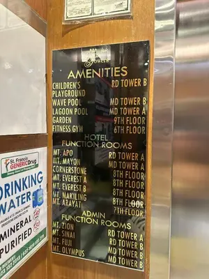 a sign on the door of a restaurant with the names of the dishes at Exquisite Stays Private 2BR Rental in Manila
