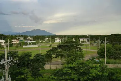 a view of a park with trees and houses at Nuvali Laguna Amaia 2BR free parking @ The Sanctuary near Tagaytay and Carmelray Industrial Park in Numero Dos