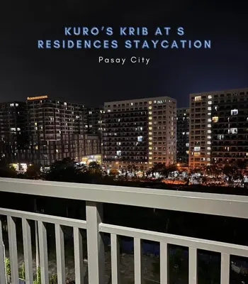 a view of a city at night from a balcony at Kuro's Krib One Bedroom Condo Unit with Balcony at S Residences Pasay City MOA in Manila