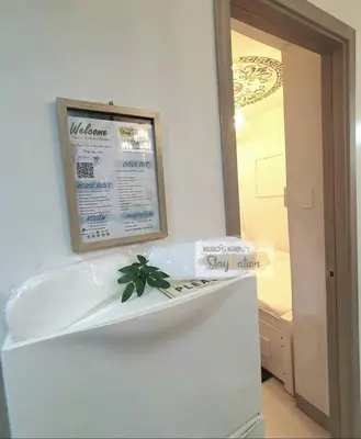 a sign on top of a refrigerator in a room at Kuro's Krib One Bedroom Condo Unit with Balcony at S Residences Pasay City MOA in Manila