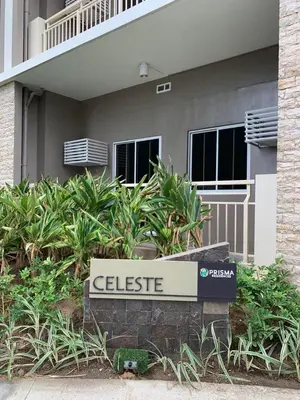 a sign that says celiste in front of a building at Prisma Residences - Celeste Bldg in Manila