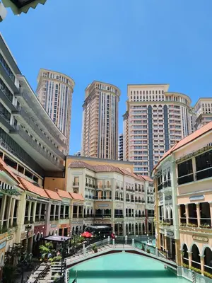 a view of a city with tall buildings at 12e Spacious Cozy Suite at The Venice Mall with FREE Parking and Washing Machine in Manila