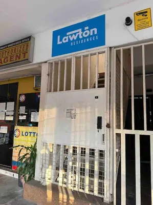 a store front with a sign that reads leniton industries at Lawton Residences Studio Room 2E in Manila