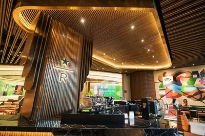a lobby of a shopping mall with a stage at E & T Homecations 2 Bedroom Apartment at SMDC Air Residences in Manila