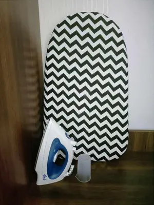 a toilet seat sitting on top of a wooden table at 2BR SMDC Bloom Residences Near NAIA Wi-fi +Netflix in Manila