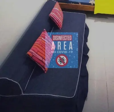 a bed with two pillows on top of it at Condo Premium Near NAIA T123 in Manila