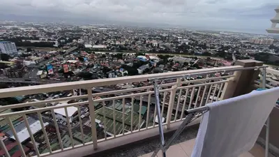 a view of a city from the balcony of a building at Prisma residence Celeste tower PH 16B with fully furnished and fast wifi for rent in Manila