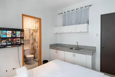 a kitchen with a sink and a counter top at JP Santiago Studio Makati J307 in Manila