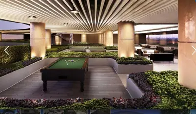 a lobby with a pool table in a building at AIR Luxury Makati CBD with balcony in Manila