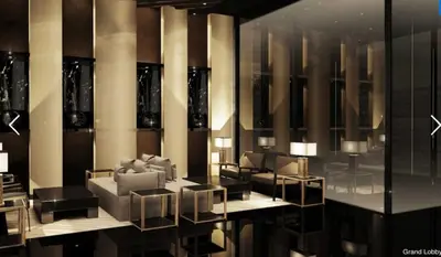 a living room with a couch and tables and chairs at AIR Luxury Makati CBD with balcony in Manila