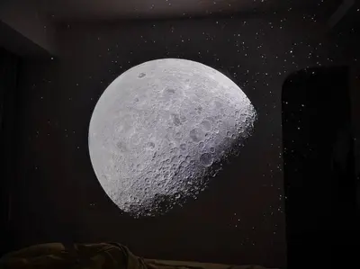 a painting of the moon in the sky at One Uptown 2-bed 1BR w/XBOX, Netflix in BGC in Manila