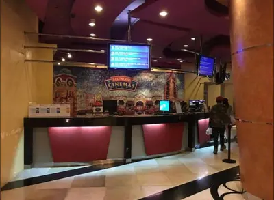 a person standing at a counter in a fast food restaurant at Awesome Eastwood Condo Suite! in Manila