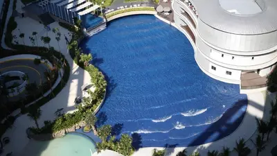 an overhead view of a pool of water next to a building at Manila Philippines, Azure Urban Resort Staycation by Leroche near Ninoy Aquino International Airport in Manila