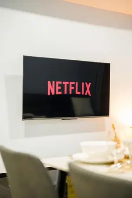 a sign that reads netflix on a wall at Luxurious 2 Bedroom in Uptown BGC Taguig in Manila