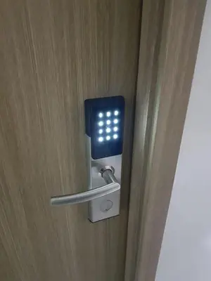 a door with a blue light on it at Hotel Luxury Twin Bed Room with Balcony Las Pinas-South Residence in Manila