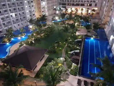 an aerial view of a hotel with a swimming pool at SHORE RESIDENCE D15 shortwalk Mall of asia near airport in Manila
