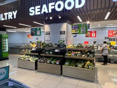 a store filled with vegetables and fruits on display at Cozy Condo Apartment in Makati / Manila with mall, restaurants, groceries, pool, netflix, disney+ and more in Manila