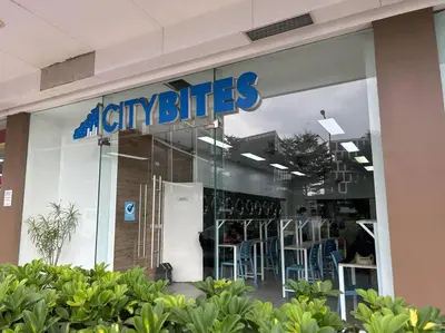 a store front window of a city buicks store at DFA ASEANA 1158 DYNASTEL SHORE Staycation in Manila