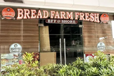 a bread farm fresh sign on the front of a store at MALL OF ASIA 1149 DYNASTEL SHORE Staycation in Manila