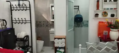 a small bathroom with a toilet and a sink at 6 Guest - Unit 2 Studio type in Santa Rosa