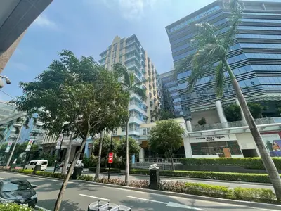 a street in a city with tall buildings at 150 Newport Boulevard, near Terminal3 Airport in Manila