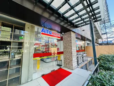 an entrance to an atm store with a red carpet at Fancy Condo with Unli Wifi and Netflix in Manila