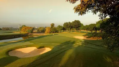 an overhead view of a golf course with a green at Ever Stays at Light Residences 1BR in Manila