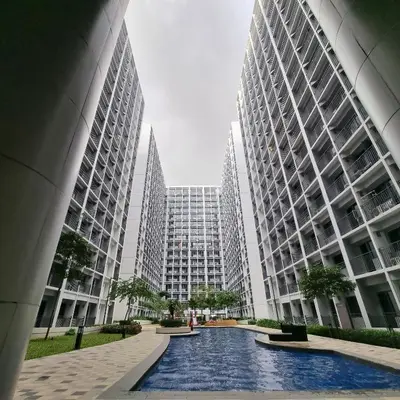 a view of two tall buildings in a city at Goshen E320 in Manila