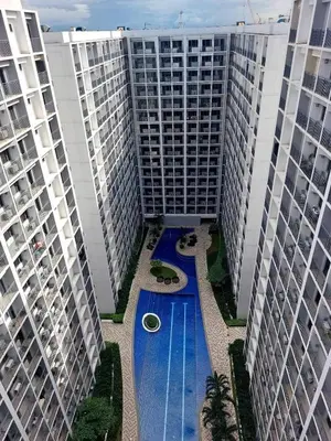 an aerial view of two tall buildings with a swimming pool at Goshen E320 in Manila