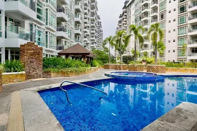a swimming pool in the middle of a building at PSV NAIA T3 - Month of January - New Year 2026 PROMO Php 1,999 - 1 BR Interior Designed Unit in Manila