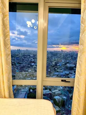 a view of a city from a window at Mandaluyong Staycation in Manila