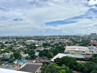 a view of a city with buildings and trees at The Atherton in Manila