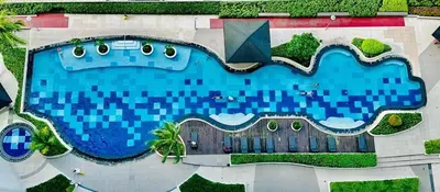 an overhead view of a large swimming pool at The Beacon Makati in Manila