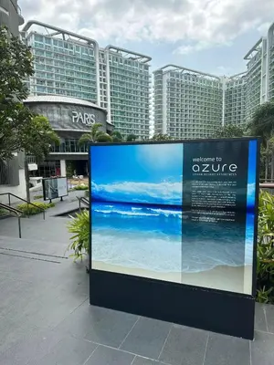 a large billboard in front of a resort at Azure Urban Resort Residences Paranaque 2 Bedroom Unit in Manila