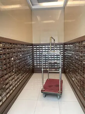 a walk in closet with a cart in it at Cozy Staycation Condo for Family in Ermita in Manila