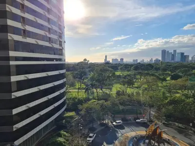 a view of a city from the side of a building at Cozy 2BR in BGC near golf course - B Fort TB in Manila