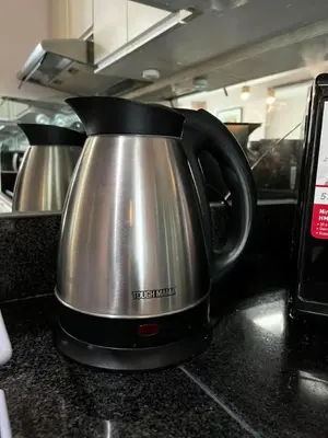 a tea kettle on a counter in a kitchen at The Beacon Condo (1BR Unit) in Manila