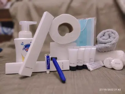 a pile of toiletries and a roll of toilet paper at Destina @Air Residences Makati, Metro Manila in Manila