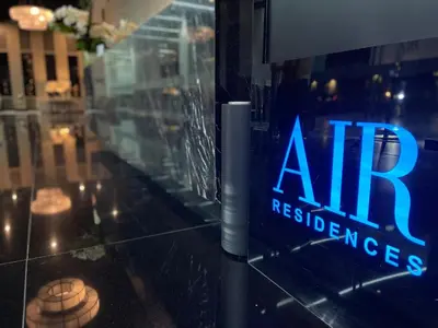 a sign in a window of an alliances restaurant at Destina @Air Residences Makati, Metro Manila in Manila