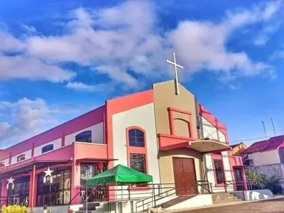 a church with a cross on top of it at Elegant 2BR Condo unit with free WiFi in Anabu Primero